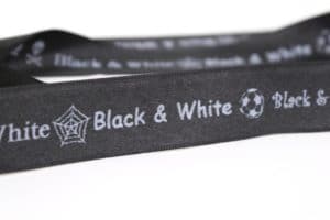 Satinband schwarz mit weissem Druck (Black & White) -